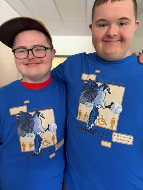2026-jays-cares-students-with-shirt-student-designed-logo.8c306627947.jpg