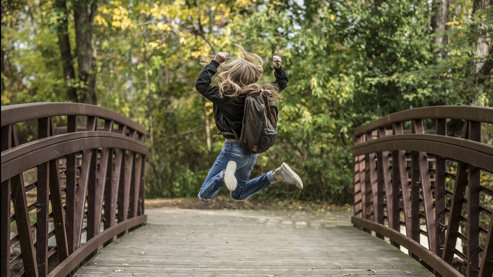 Excited girl jumping