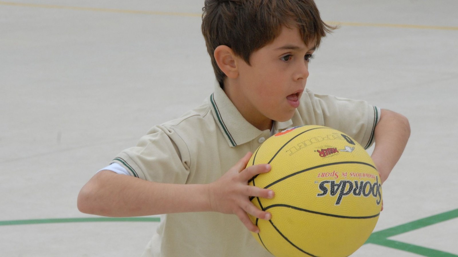 boy playing basketball